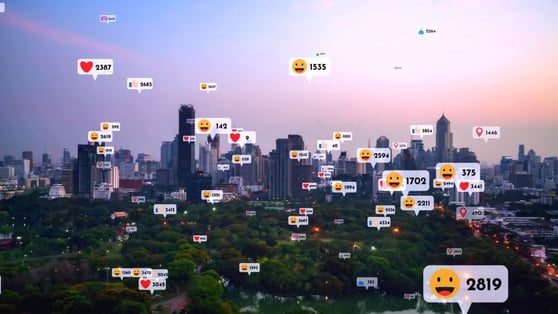 Social media icons fly over city downtown showing people reciprocity connection through social network application platform.